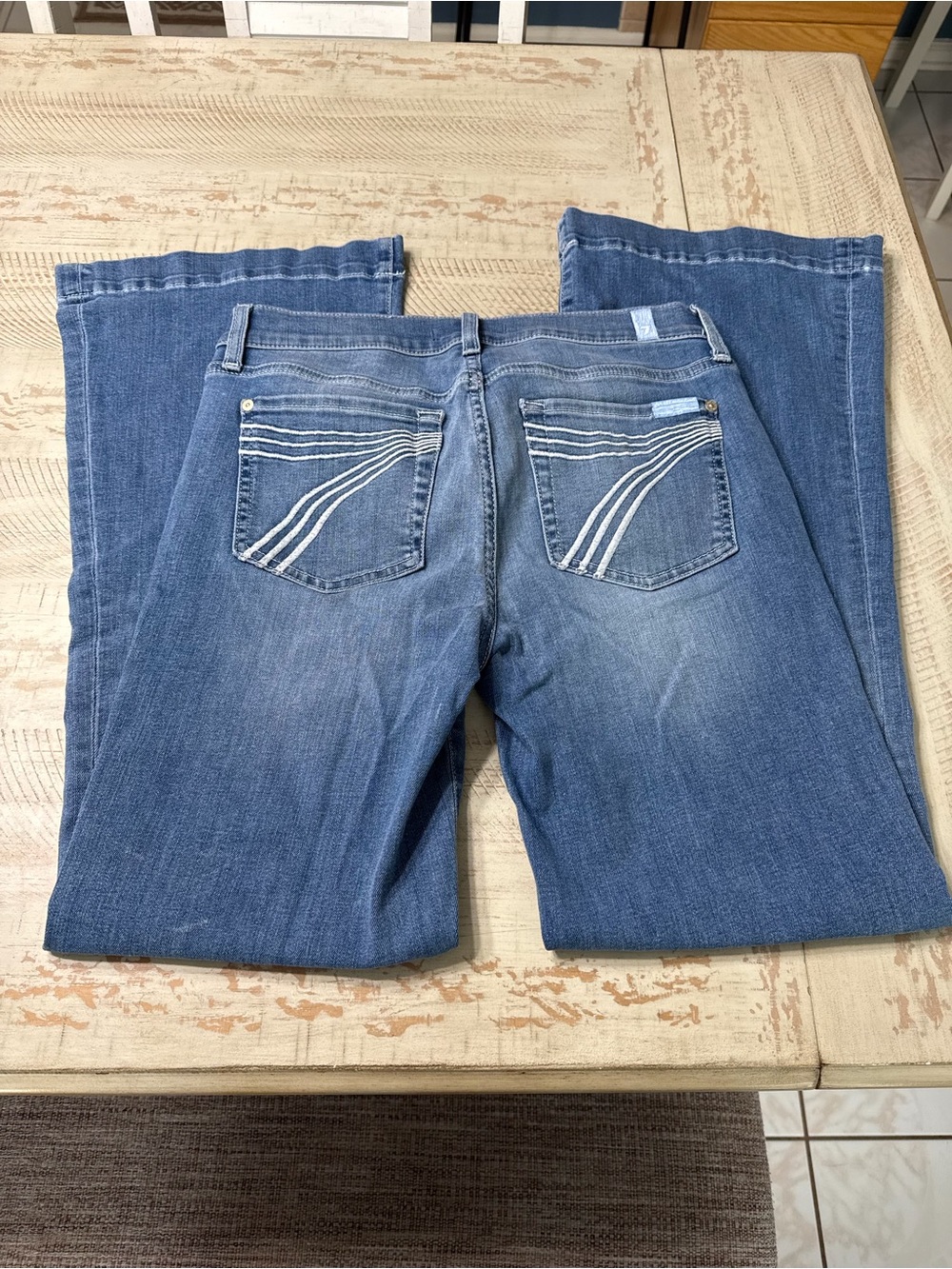 7 For All Mankind Women's Blue Flare Jeans with Back Pocket Stitching